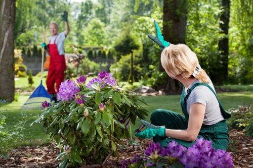 Gardening team arriving at a residential garden for a safety brief